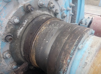 湿式格子型球磨机中空轴磨损现场修