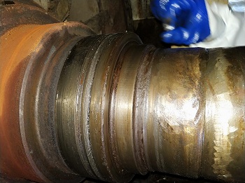 烘缸轴磨损原因分析及在线修复