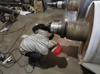 4600纸机压榨辊轴承位磨损修复